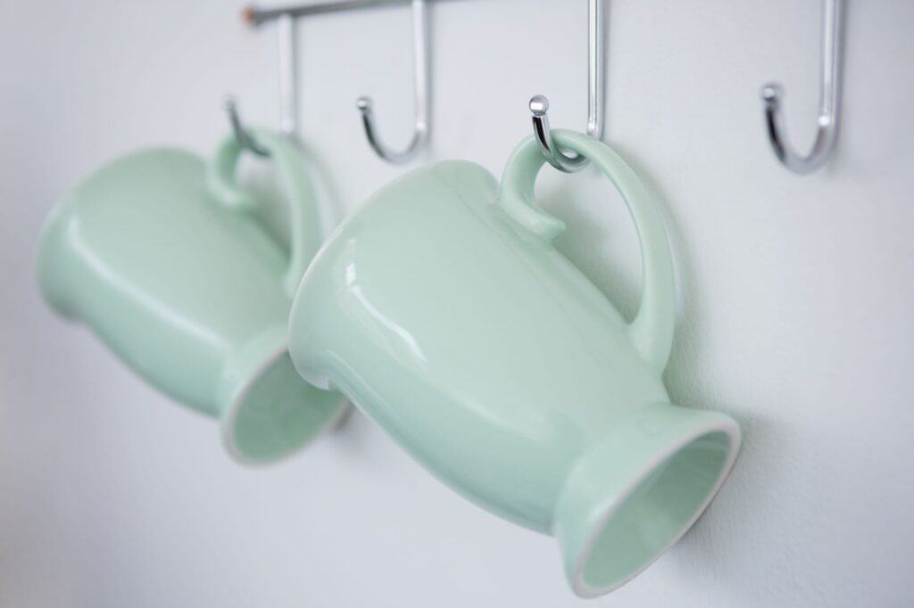 Mugs hanging on a hook